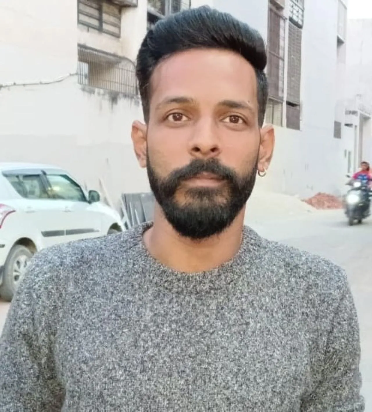 कि