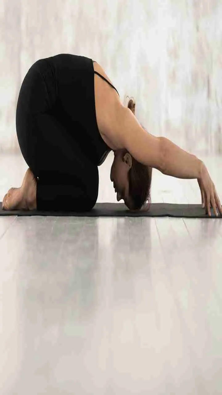 5 Yoga Poses that Can Help You with Hair Growth - Cosmopolitan India