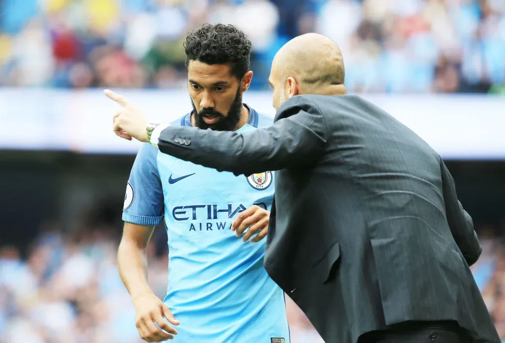 Gael Clichy receiving instructions from Pep Guardiola- Sportz Point.com