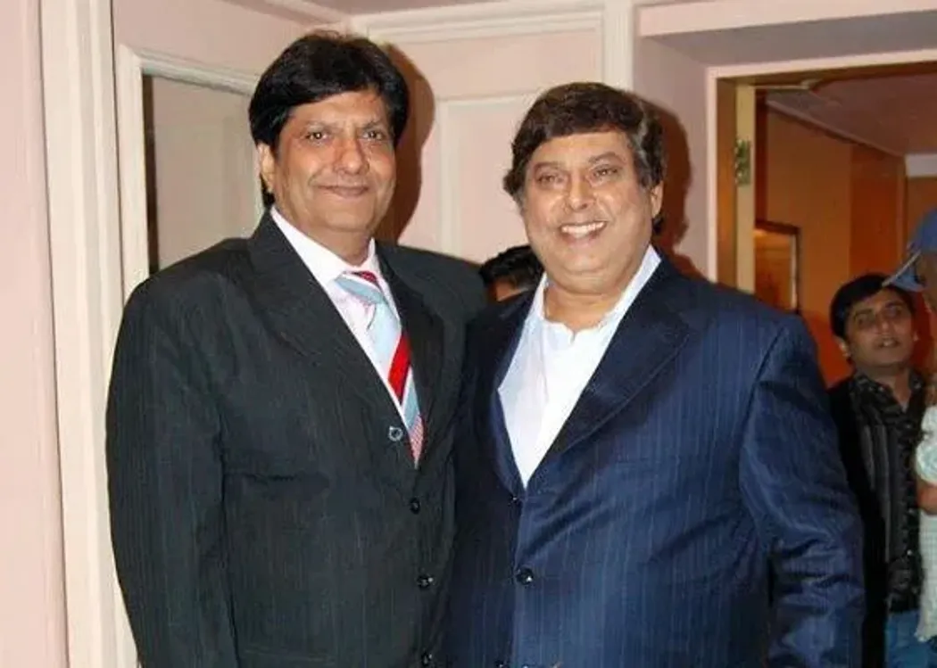 I don't want to work with a producer who can't stand shoulder to shoulder with me - David Dhawan