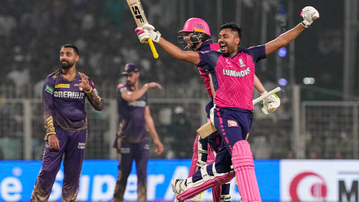 Rajasthan Royals batters Jos Buttler and Avesh Khan celebrate after Rajasthan won the Indian Premier League (IPL) 2024 cricket match against Kolkata Knight Riders, at Eden Gardens in Kolkata, Tuesday, April 16, 2024.
