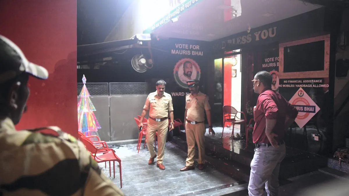Police personnel at the site where Shiv Sena (UBT) leader Vinod Ghosalkar's son Abhishek was shot, in Mumbai, Thursday, Feb. 8, 2024. Abhishek was shot dead during a Facebook live by local social activist Mauris Noronha, who also ended his life by shooting self, according to police.