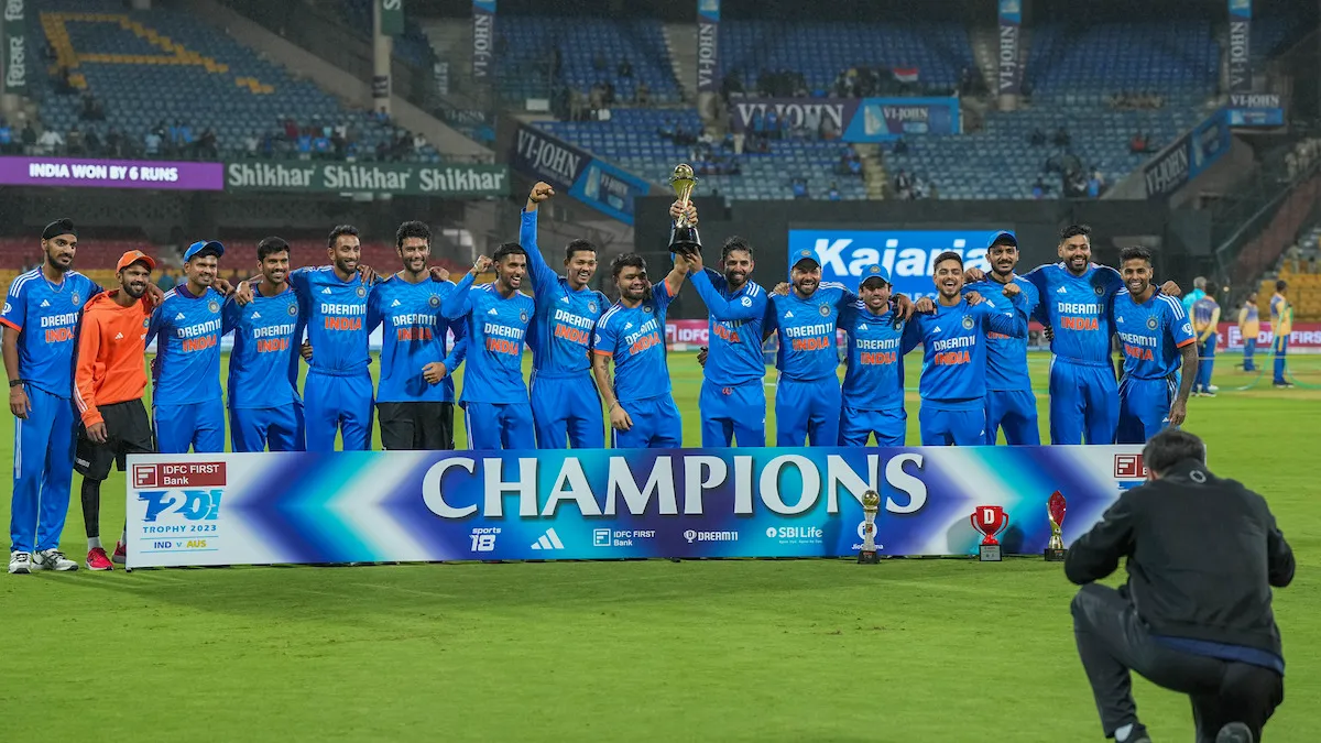 Team India poses with the trophy after winning the 5-match T20I cricket series against Australia, at M. Chinnaswamy Stadium, in Bengaluru on Sunday, Dec. 3, 2023.