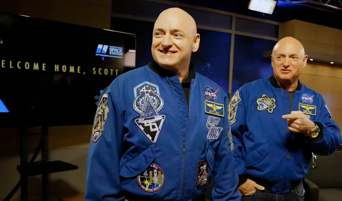 NASA astronaut Scott Kelly, left, who went into space during the NASA Twins Study, stands next to his twin brother, Mark Kelly, who stayed on Earth. AP Photo/Pat Sullivan