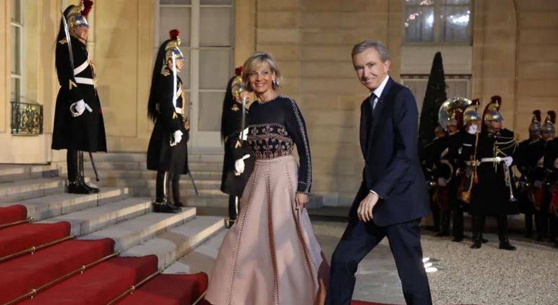 LVMH CEO, Bernard Arnault and his wife Helene Mercier Arnault pose in front  of Christain Dior's house and museum in Granville, Britain coast of France  on May 14, 2005 for the celebration