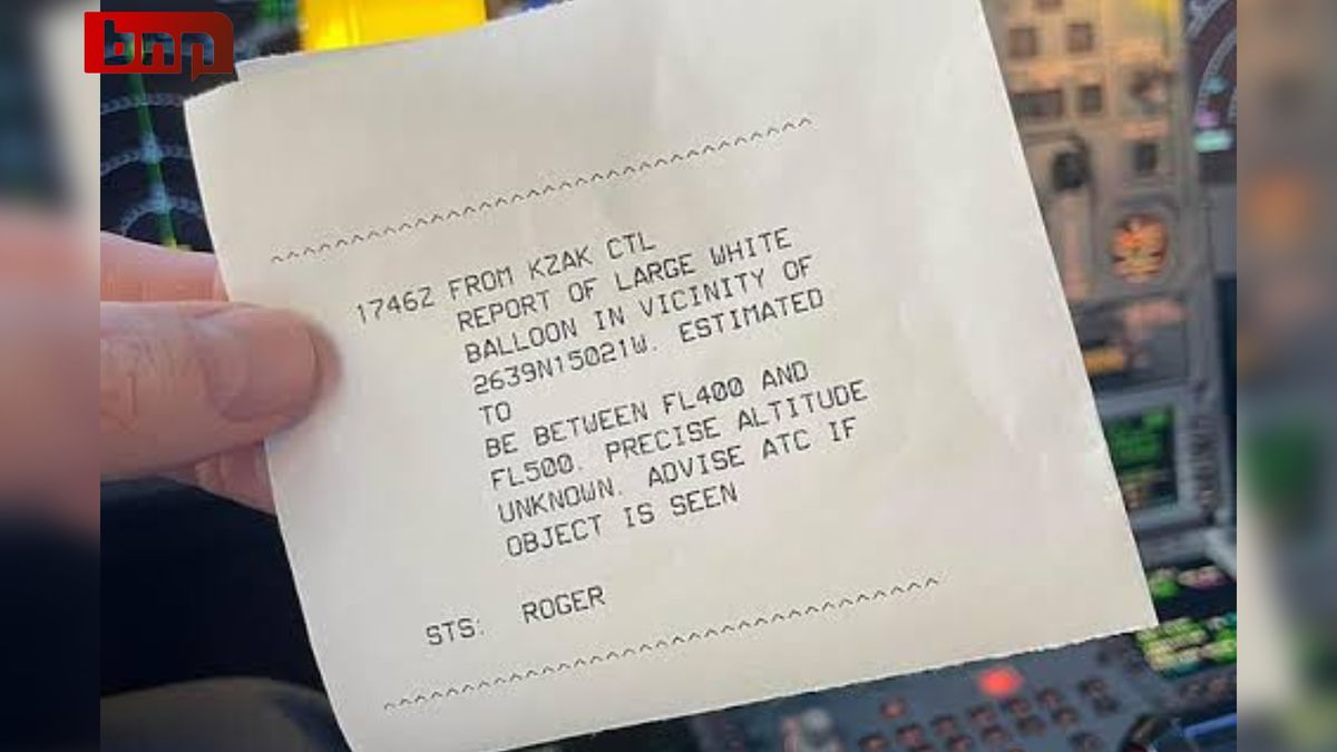 A large white balloon is seen floating over Honolulu, Hawaii