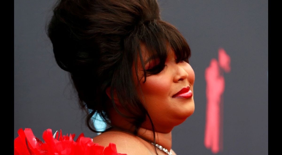 Lizzo says she 'got addicted' to seeing herself with makeup