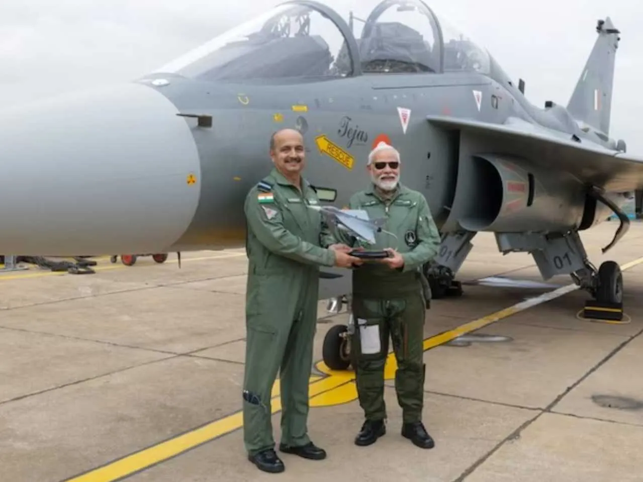 PM Narendra Modi with Tejas Fighter Jet