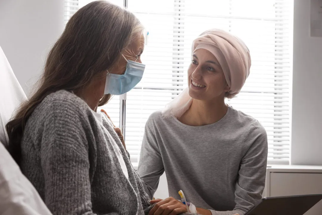 female-patients-talking-hospital-indoors-scaled .