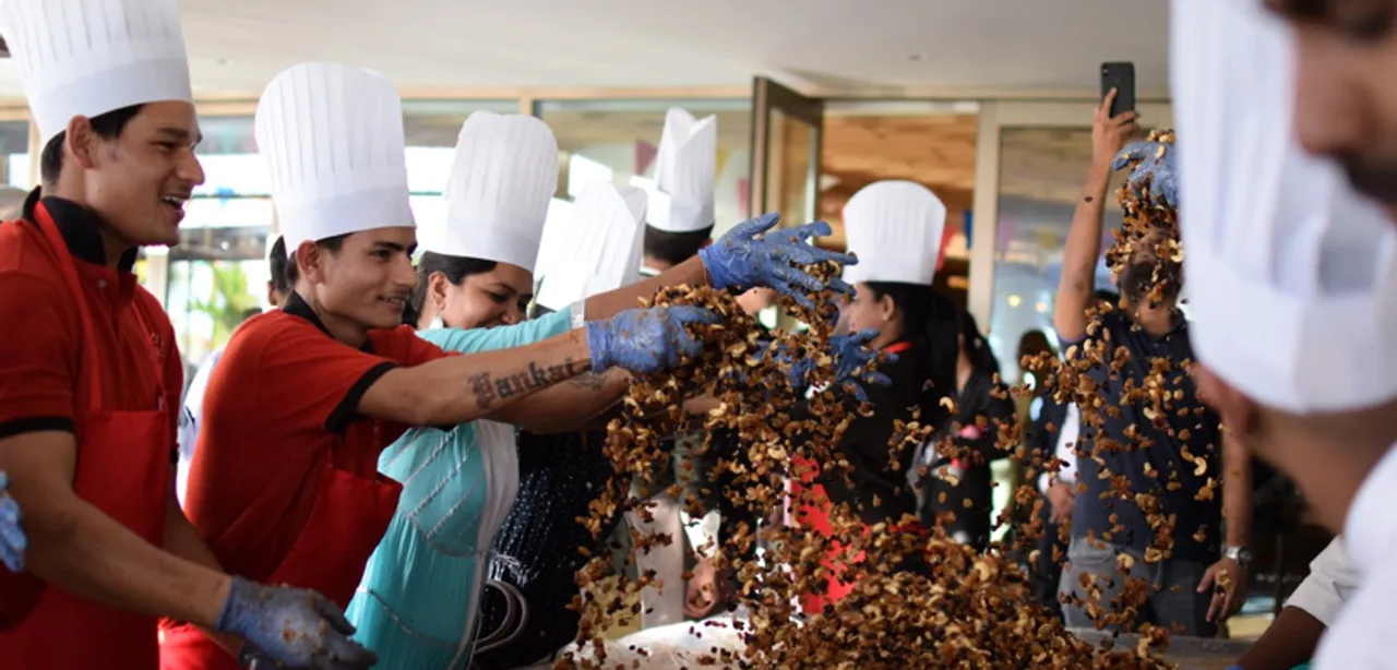 Cake Mixing Ceremony held at Grand Hyatt Kochi Bolgatty