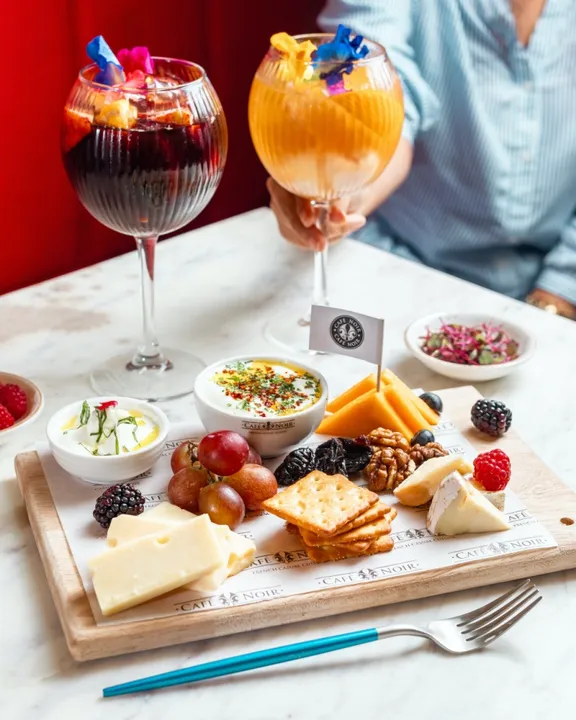 Celebrate Wine & Cheese Day at Cafe Noir