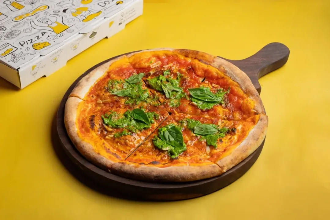 Raise a Slice to Women: Women's Day Extravaganza at The Greedyman Pizzeria