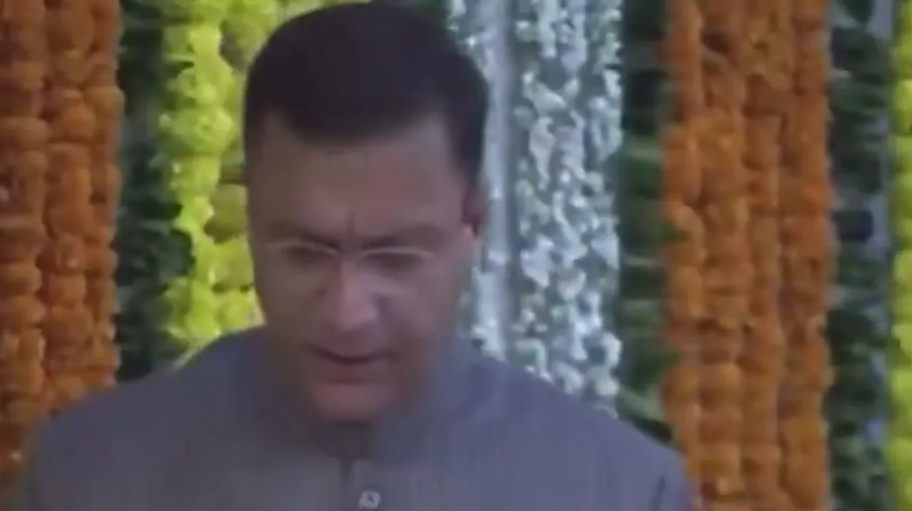  Akbaruddin Owaisi takes oath as protem Speaker of Telangana Assembly