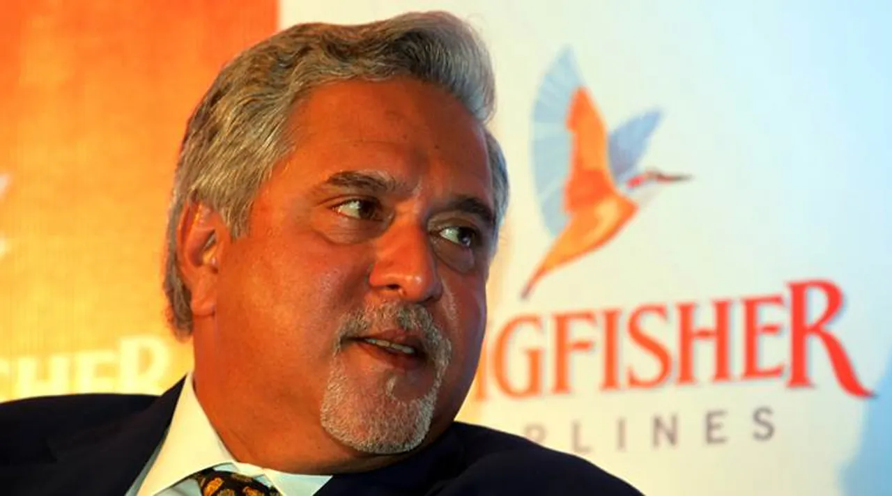  Kingfisher chairman Vijay Mallya arriving to address a media conference to explain the airline's plans to stay afloat  in Mumbai on Tuesday. *** Local Caption *** Kingfisher chairman Vijay Mallya arriving to address a media conference to explain the airline's plans to stay afloat  in Mumbai on Tuesday. Express Photo By Dilip[ Kagda.15112011. Mumbai. 