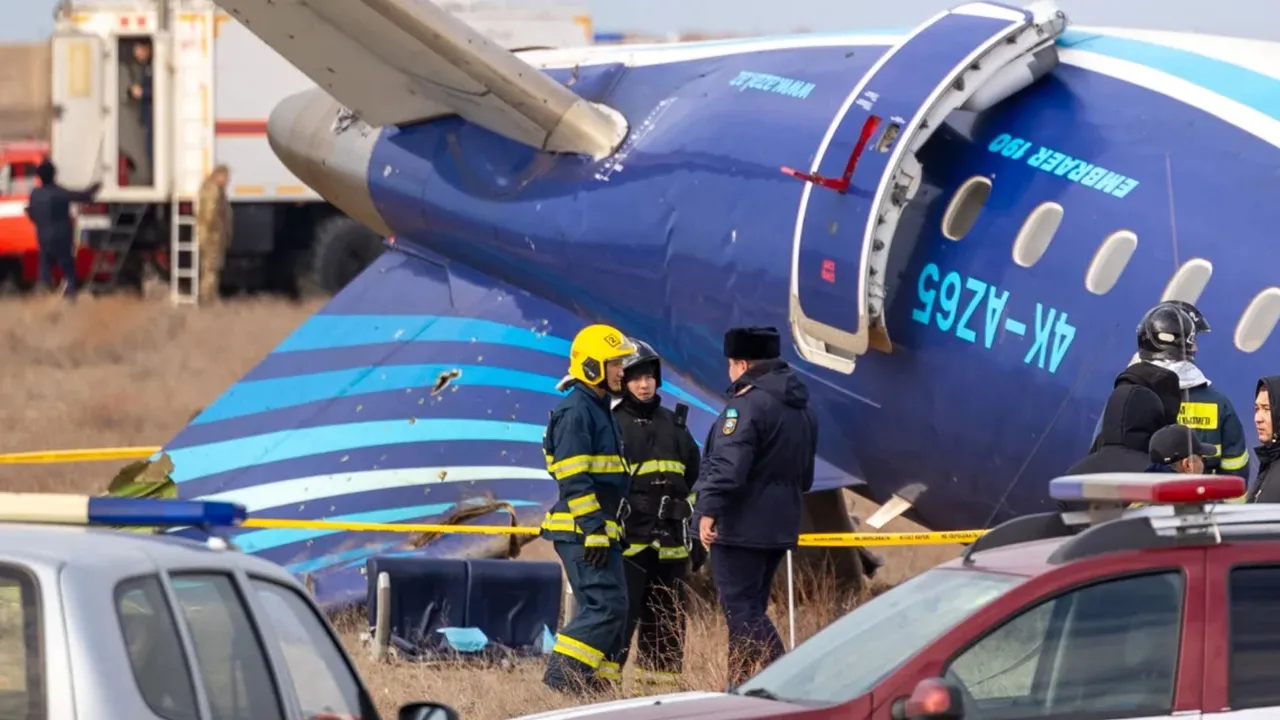  Emergency specialists work at the crash site in Aktau, western Kazakhstan Photograph: (AFP) 