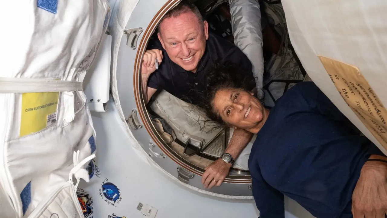  File Photo: This undated handout picture from Nasa released on July2, 2024 shows NASA’s Boeing Crew Flight Test astronauts (from top) Butch Wilmore and Sunita Williams inside the vestibule between the forward port on the International Space Station’s Harmony module and Boeing's Starliner spacecraft.  Photograph: (AFP) 
