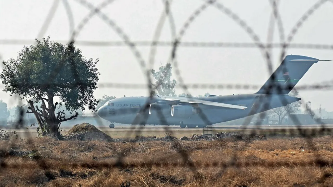 This file image shows a US military aircraft carrying over 100 illegal Indian immigrants at the Shri Guru Ramdas Ji International Airport in Amritsar on February 5. Two more such deportation flights landed in the same airport this weekend. Photograph: (AFP) 