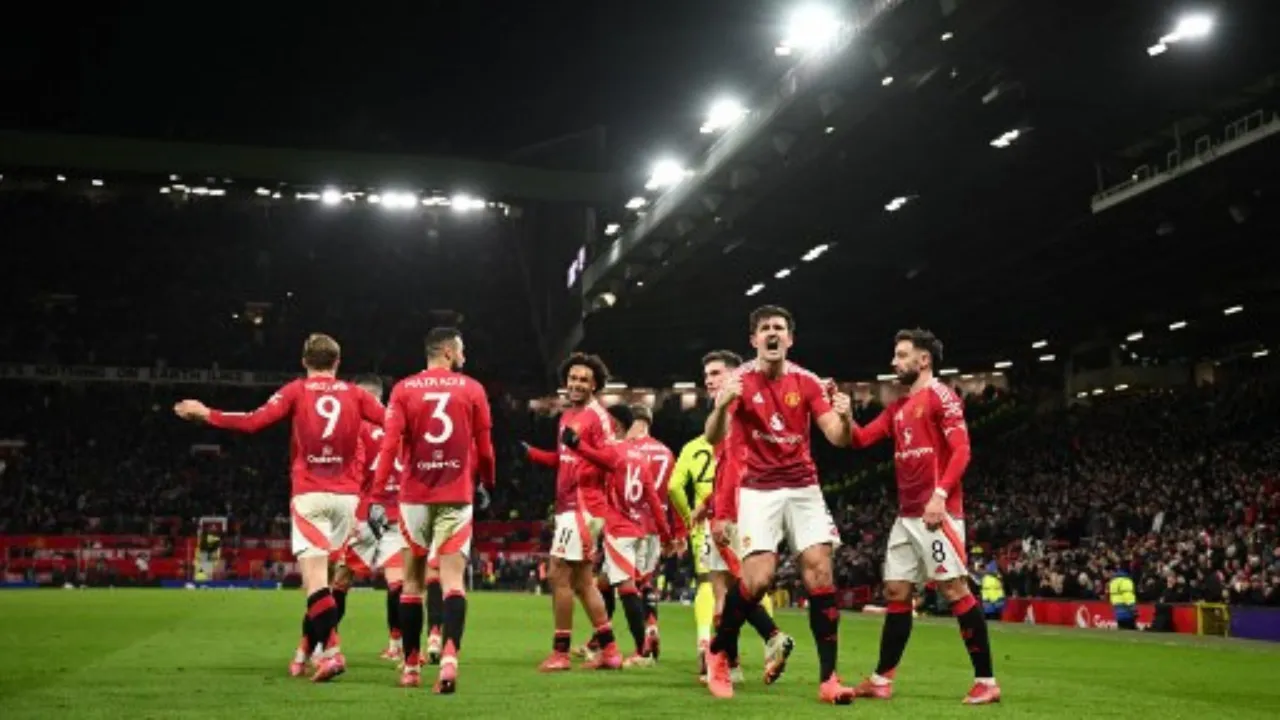  Manchester United players celebrate Photograph: (AFP) 