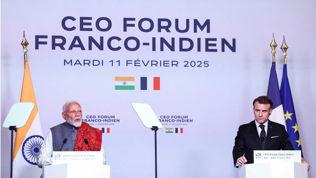  Indian Prime Minister Narendra Modi (L) delivers a speech next to French President Emmanuel Macron during the closing session of the Franco-Indian Economic Forum at the Quai d'Orsay Photograph: (AFP) 
