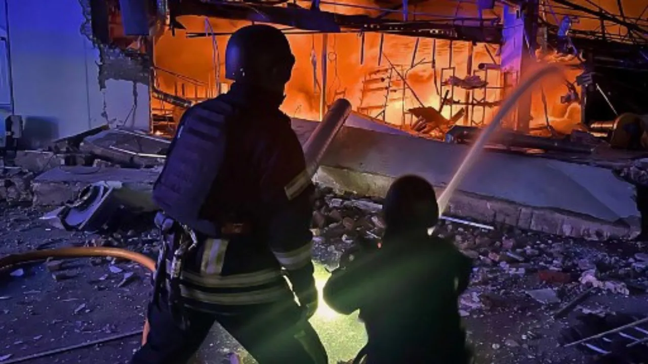  This handout photograph released by the Ukrainian Emergency Service on February 12, 2025, reportedly shows Ukrainian rescuers working to extinguish a fire in a building following a missile attack at an undisclosed location in the Kyiv region. Photograph: (AFP) 