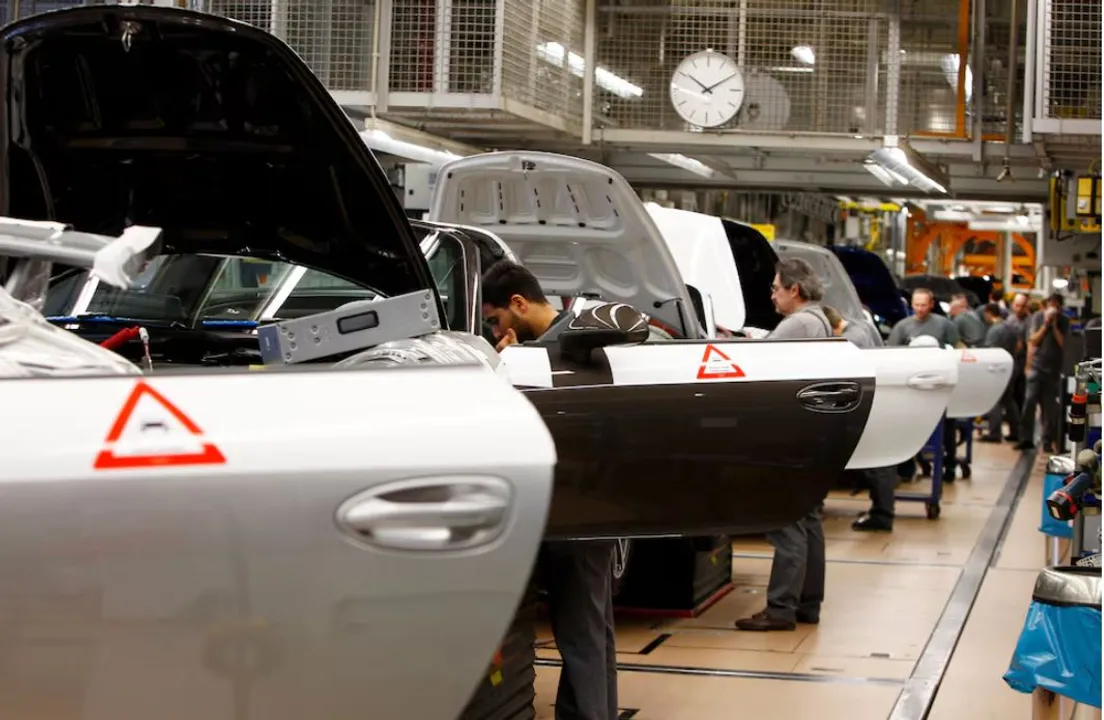  Porsche to cut 1,900 more jobs by 2029 amid industry challenges   Photograph: (Reuters) 