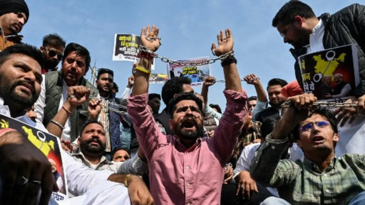  Members of Youth Congress shout slogans as they protest against the Indian and US governments in Amritsar on February 16, 2025, after the deportation of undocumented Indian migrants to India by the US government. Photograph: (AFP) 