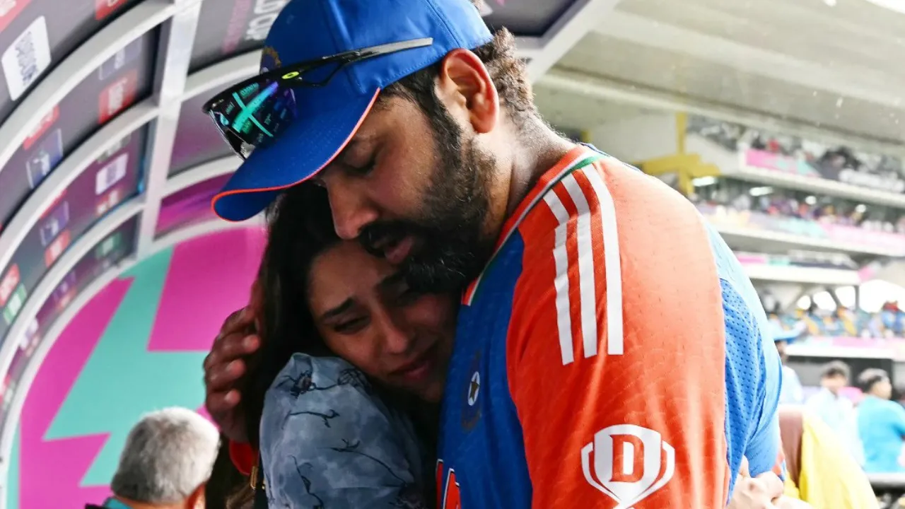  Rohit Sharma with his wife Photograph: (AFP) 