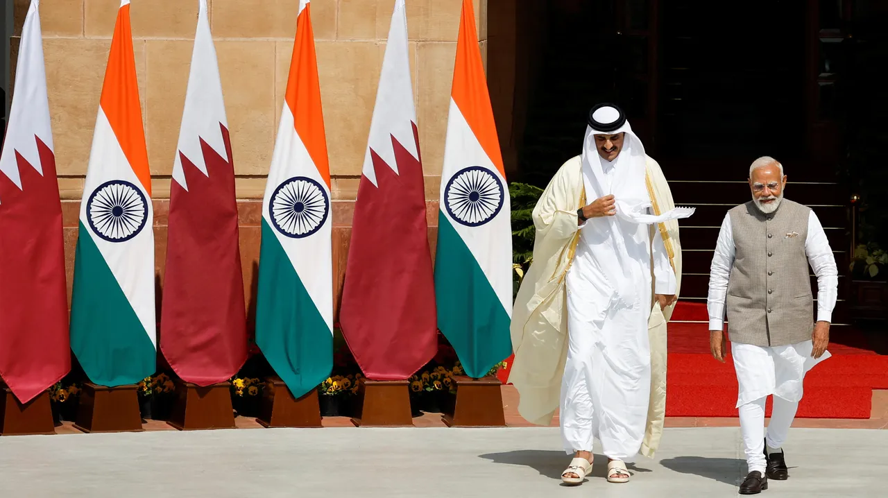  Emir of Qatar Sheikh Tamim bin Hamad Al Thani shakes hands with India's Prime Minister Narendra Modi Photograph: (Reuters) 