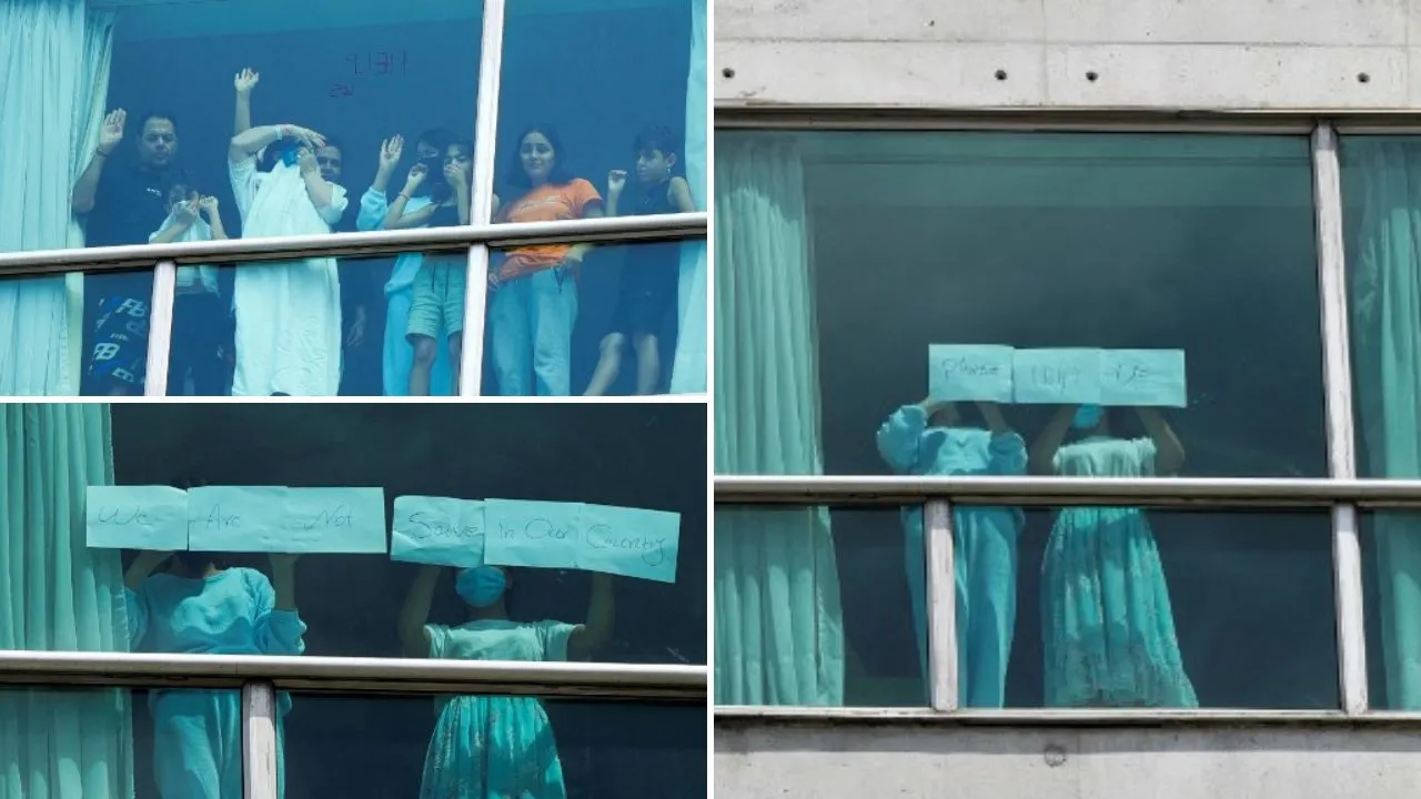  Indians among 300 US deportees plead for help from Panama hotel windows Photograph: (AFP) 
