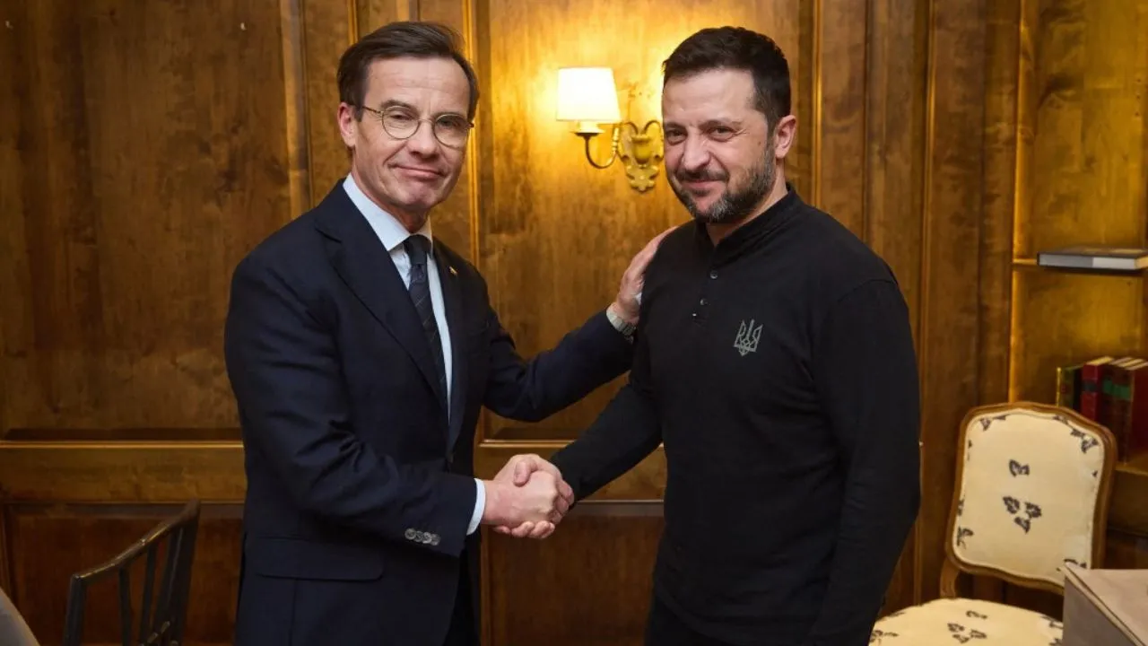  In this handout photograph taken and released by the Ukrainian Presidential Press Service on February 15, 2025, Ukraine's President Volodymyr Zelensky (R) shakes hands with Sweden's Prime Minister Ulf Kristersson (L). Photograph: (AFP) 