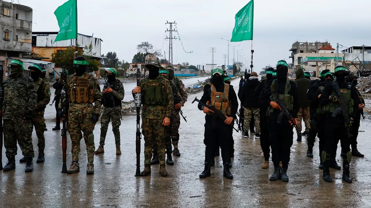  Hamas militants stand guard in Rafah, southern Gaza, ahead of an expected release of Israeli hostages in exchange for Palestinian prisoners and detainees.  Photograph: (Reuters) 