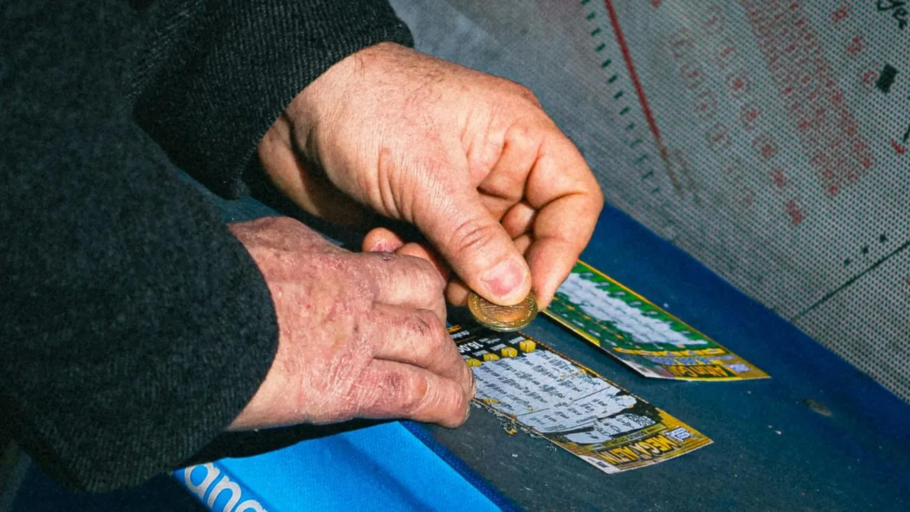  Representative image of a person scratching a lottery ticket. Photograph: (Pexels) 