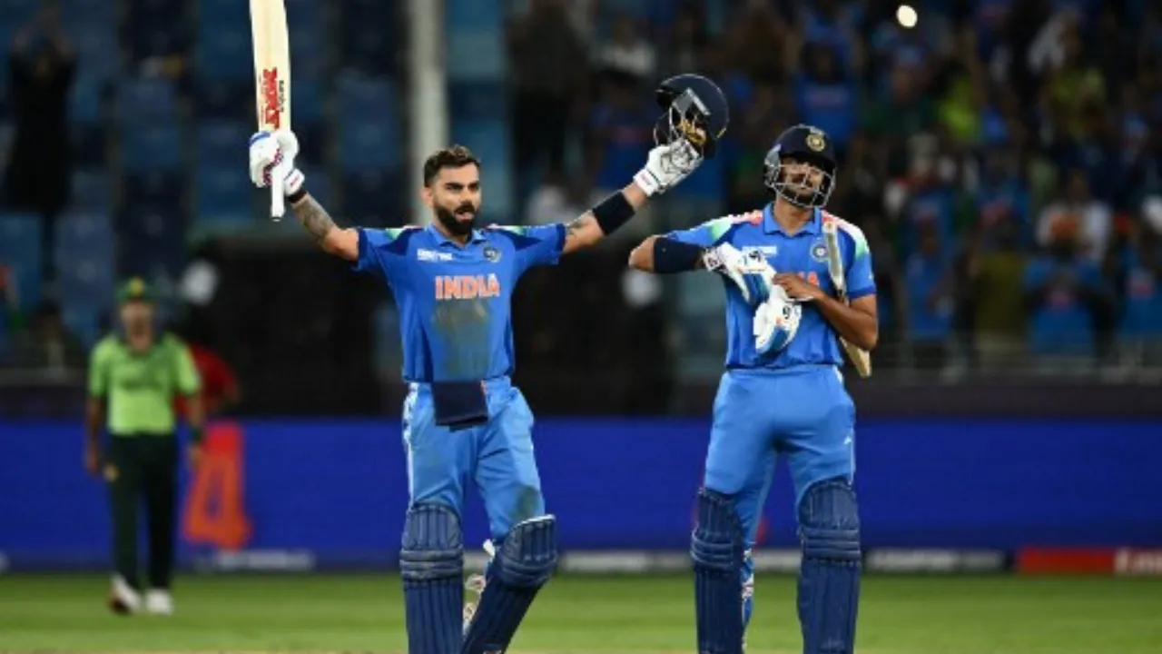  Virat Kohli celebrates his century against Pakistan, Photograph: (AFP) 