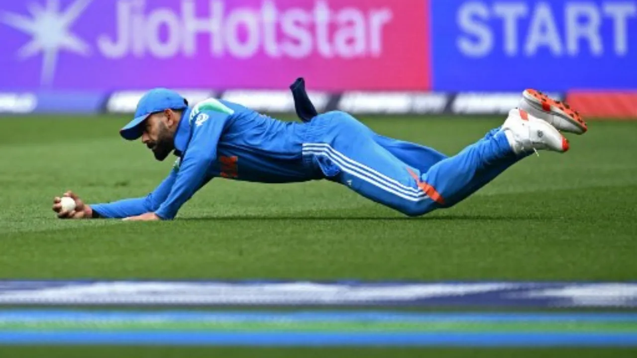  Virat Kohli takes a catch  Photograph: (AFP) 