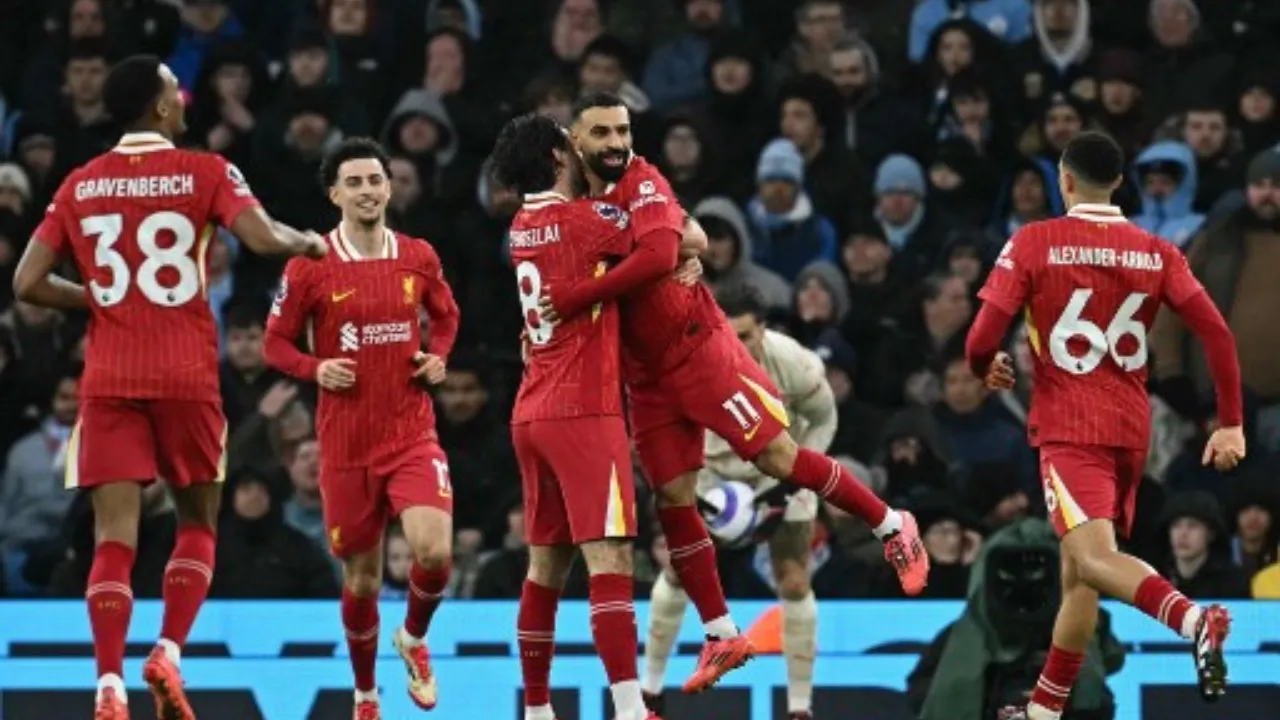  Salah celebrates his goal Photograph: (AFP) 
