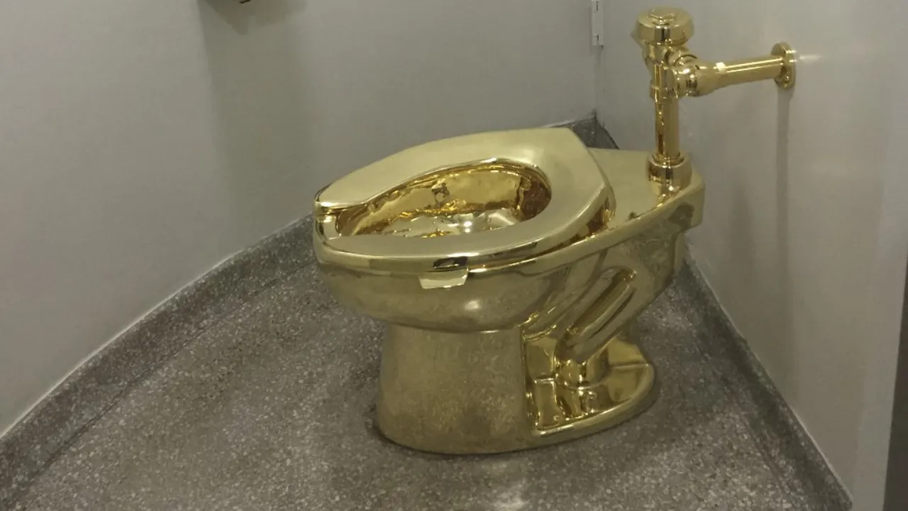  A fully functioning solid gold toilet, made by Italian artist Maurizio Cattelan, September 15, 2016. Photograph: (AFP) 