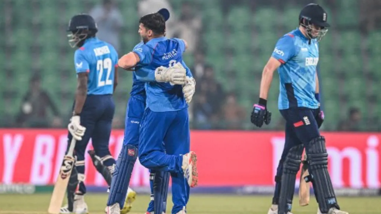  Afghanistan players celebrate a wicket Photograph: (AFP) 