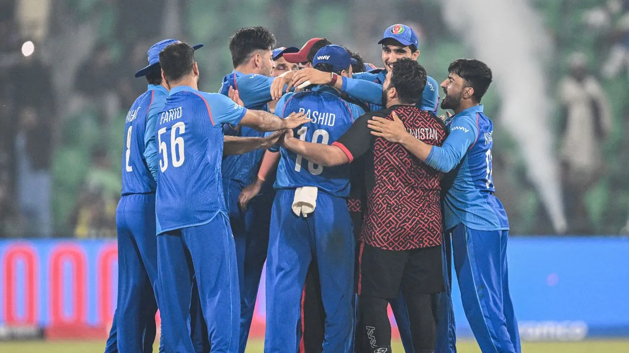  Watch - Dressing room erupts in joy after Afghanistan win first Champions Trophy match Photograph: (AFP) 