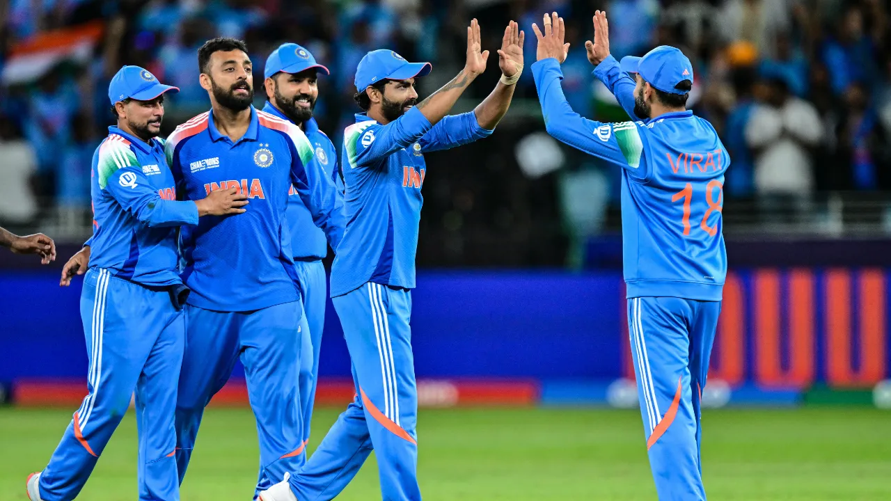  Indian players celebrate a wicket Photograph: (AFP) 