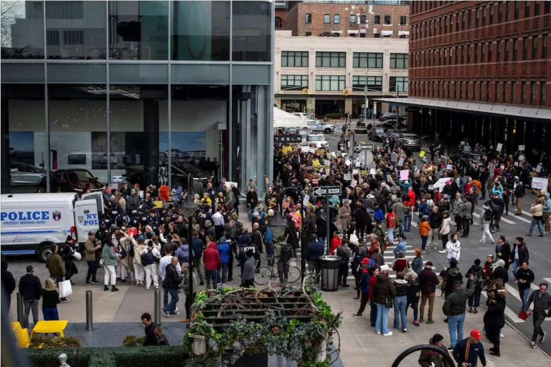  Anti-Musk protests erupt at Tesla dealerships across US, nine arrested in New York Photograph: (Reuters) 