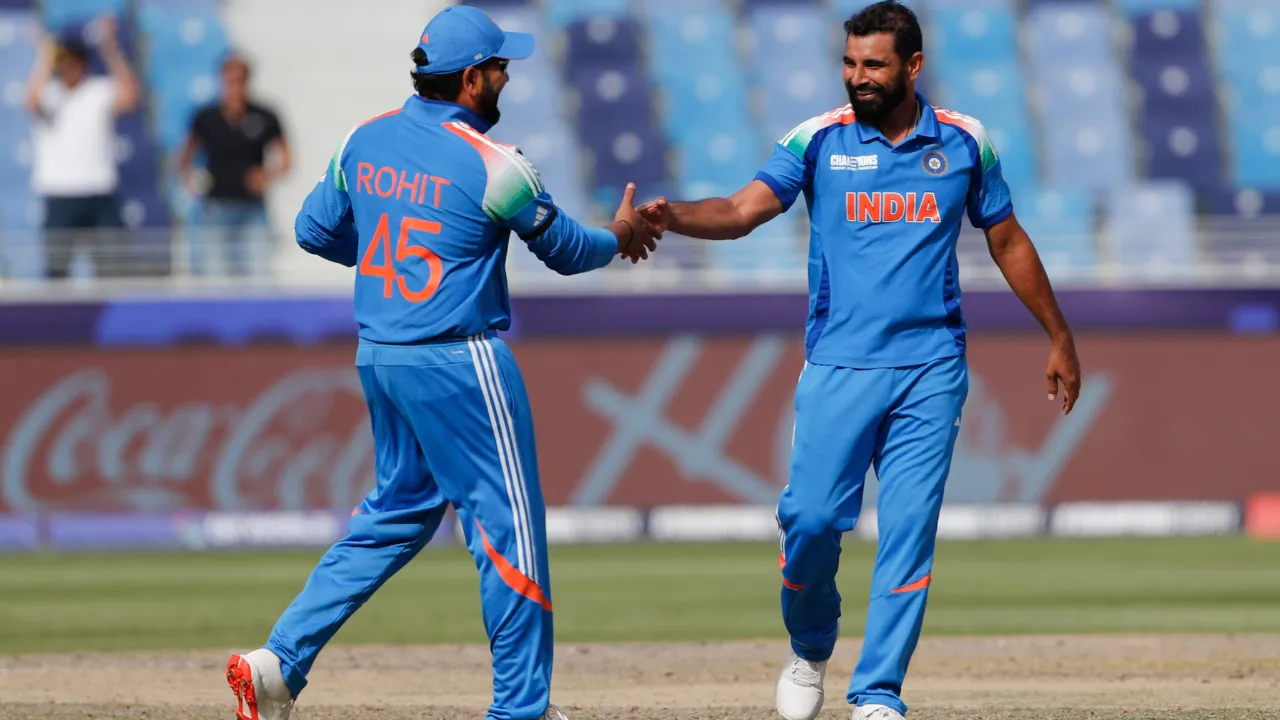  Rohit Sharma and Mohammed Shami during the match Photograph: (X (@BCCI)) 