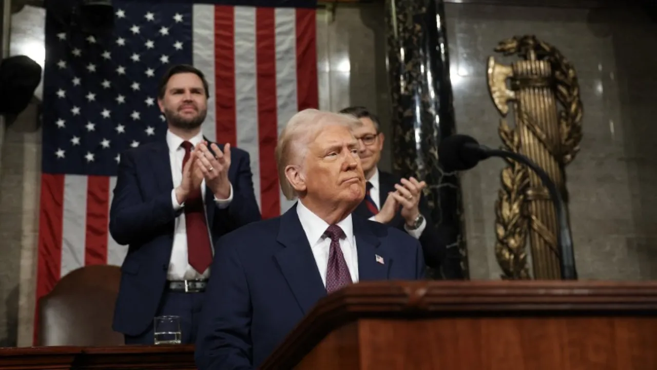  US President Donald Trump stands as he concludes his address to a joint session of Congress in the House Chamber of the US Capitol in Washington, DC, on March 4, 2025. Photograph: (AFP) 