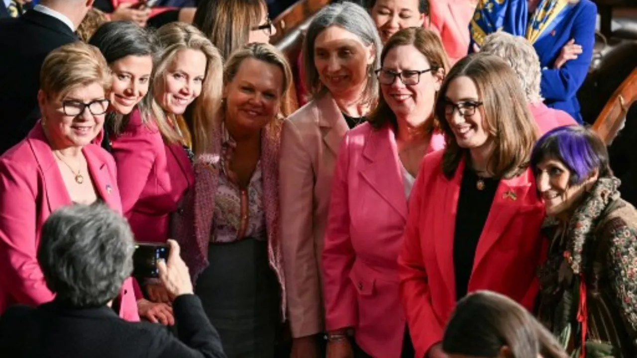 Female Democratic lawmakers in pink at presidential address. Photograph: (AFP) 
