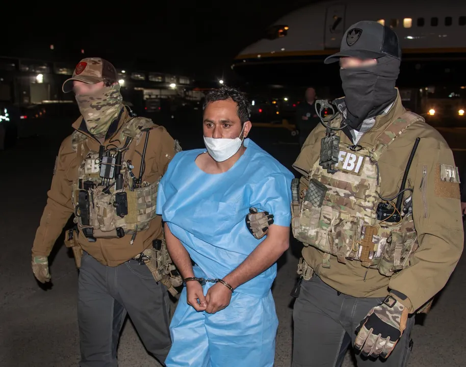  Mohammad Sharifullah, suspect in the 2021 Kabul airport bombing, being extradited to the US in this photo shared by FBI chief Kash Patel Photograph: (X) 