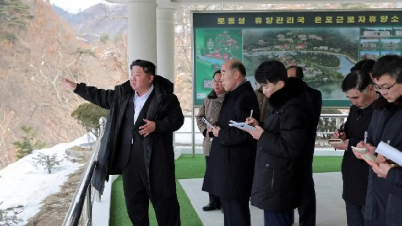  This undated picture released from North Korea's official Korean Central News Agency (KCNA) via KNS on March 8, 2025 shows North Korean leader Kim Jong Un (L) inspecting a development project at the Onpho Kulloja (working people) Holiday Camp in North Hamgyong Province of North Korea. Photograph: (AFP) 