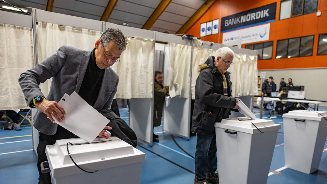  People cast their ballots at the polling station in Nuuk, Greenland, on March 11, 2025, on the day of Greenland, the autonomous Danish territory legislative elections Photograph: (AFP) 