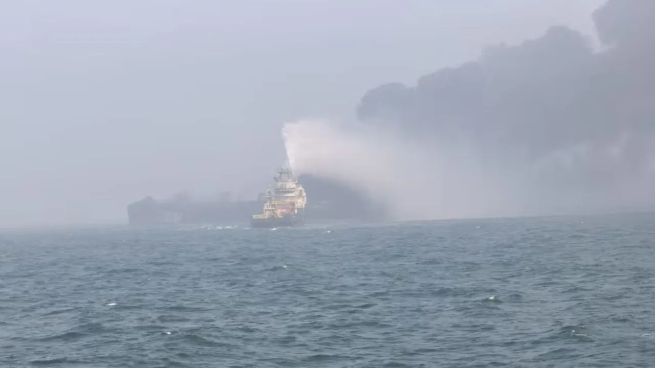  Fire and rescue service crews respond to a collision between oil tanker and a cargo ship off the northeastern coast of England. Photograph: (Reuters) 