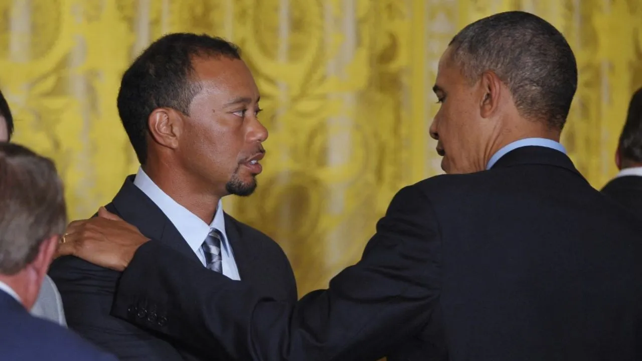  Barack and Michelle Obama in talks to produce Tiger Woods film – Report Photograph: (AFP file) 