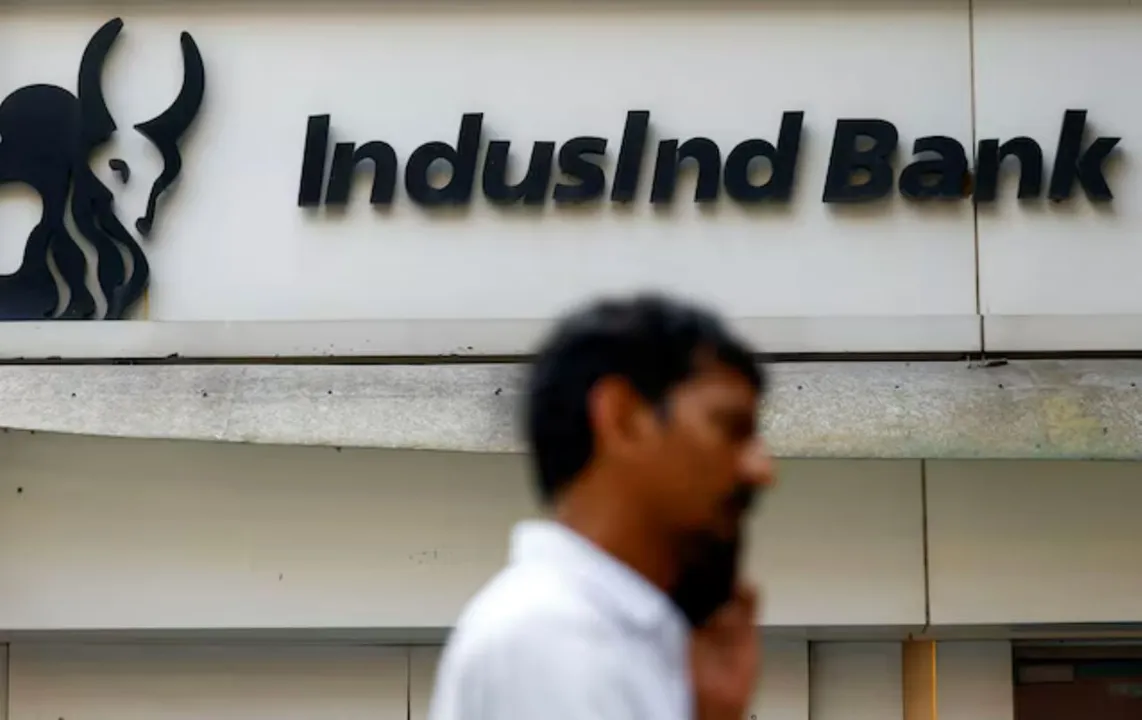  A man walks outside a branch of IndusInd Bank in New Delhi, India Photograph: (Reuters) 
