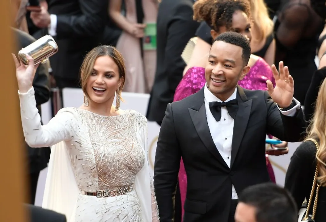  Chrissy Teigan with husband John Legend Photograph:(AFP) 
